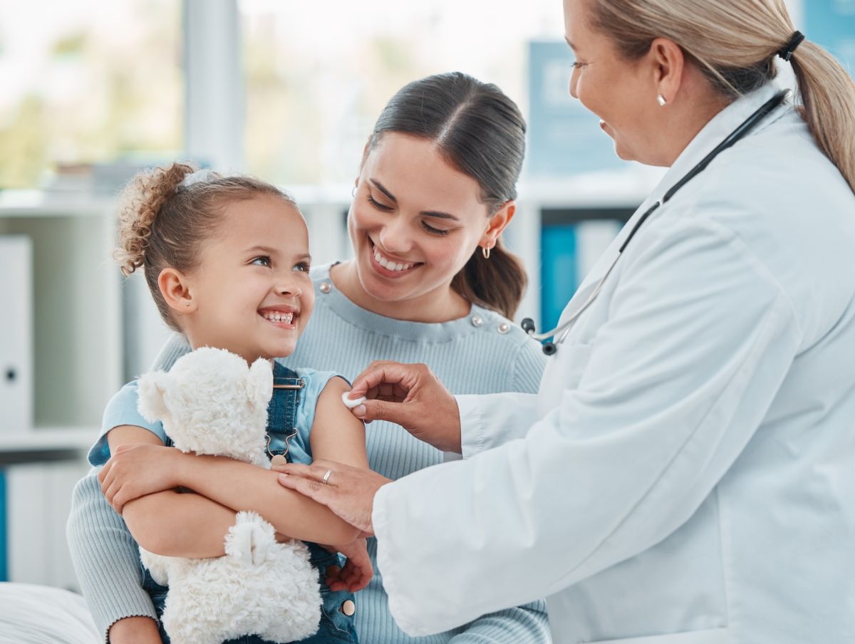 Doctor with smiling patients